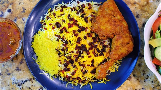 Zereshk polo ba morgh: Traditional Persian barberry rice with chicken