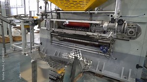 Stamping of the bottom of the aerosol container 23