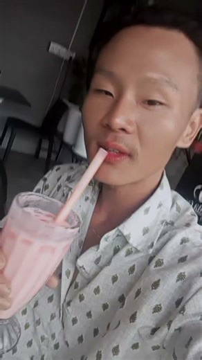 Having strawberry lasi at rain outside @KokxingChamlingRai #strawberry#viralvideo #follower#fryp