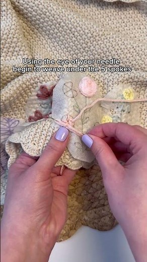 Embroidering a textured rose with the woven wheel stitch. Using weight 4 acrylic yarn! #embroidery