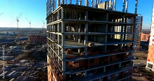 The construction of an apartment building, the construction of an office building