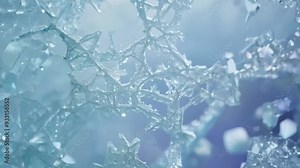 Beautiful ice crystals forming a unique pattern on a window during a cold winter day, creating a delicate and intricate design