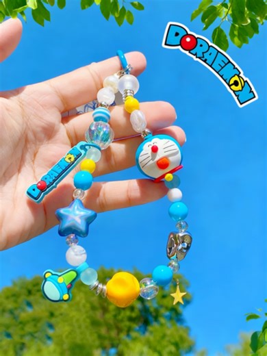 Doraemon Series Shiny Phone Charm Keychain - Blue Edition, Adorable Doraemon Figure With Colorful Beads & Stars, Cute Cartoon Accessory For Phone Decoration, Unique Gift For Anime Fans, Perfect For School & Daily Use, Popular Stylish Item For Teens & Young Adults, Eye-Catching Design With High-Quality Materials, Fits Various Phone Models & Keychains, Ideal For Collectors & Lovers Of Kawaii Culture. | SHEIN