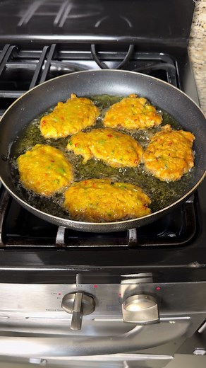 Jamaican Saltfish Fritters (Stamp & Go) 🇯🇲 Crispy on the outside, soft and flavorful on the inside—these authentic Jamaican Saltfish Fritters are a true island favorite! Packed with seasoned saltfish, fresh herbs, and bold Caribbean spices, then fried to golden perfection and paired with a creamy, tangy dipping sauce… every bite is pure yard vibes This is the kind of recipe that’s simple to make but loaded with real flavor—perfect for breakfast, snacks, or anytime you’re craving something cris