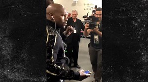 Floyd Beats Conor to Arena, Rocking Track Suit DRIPPING in Gold