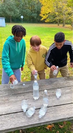 Unbelievable Bottle Flip Trick Shot All Three Bottles Land on Top!