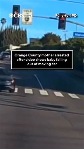 An Orange County woman was arrested on Monday after a now-viral video showed a baby falling out of a moving car last week. Video shared by the Fullerton Police Department appears to show the moment that the child, identified as a 19-month-old, falls from the ajar front passenger door and onto the street at the intersection of North Euclid street and West Malvern Avenue, sustaining non-life-threatening injuries. “The female, identified as Jacqueline Hernandez, a 35-year-old resident of La Habra a