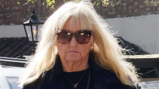 Judy Finnigan, 76, shows off slimmed down figure on day out with husband Richard