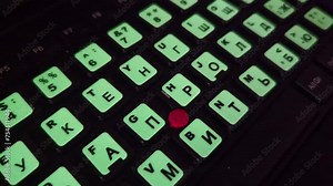 Fluorescent bilingual keyboard stickers that glow in the dark. Luminous keys for convenient computer work.