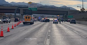 Driver dies after walking into traffic on I-15, passenger arrested