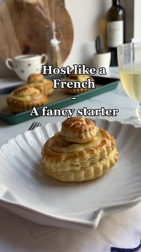 Host like a French - a fancy starter! This is a classic French “entrée” and do not say it is boring, bouchées à la reine (Bites the Queen’s way - or “Vol au vent”) is the most delicious and refinned savoury pastry there is! I make mine with prawns and scallops with a zing of lemon. For 4 : 1 ready made puff pastry 1 egg 1 carrot diced very small 15g of salted butter 150g of small scallops 100g of mini prawns For the bechamel 40g of salted butter 2 tbsp of flour Add the juice from the seafood 4 t