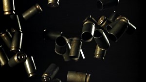 Falling Bullet Casings in Motion Photography