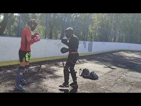 Kickboxing sparring to practice changing angles of attack