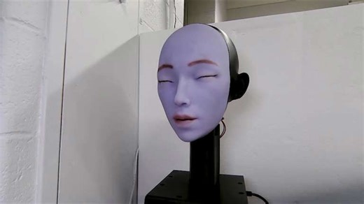 Lip-syncing robot learns to speak and sing using AI
