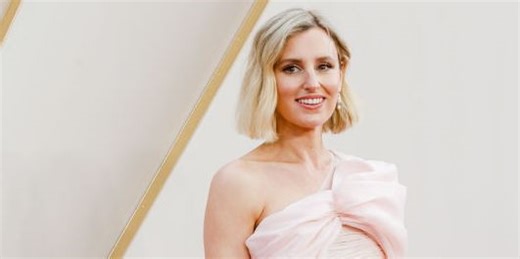 Downton Abbey's Laura Carmichael looks chic in navy striped suit