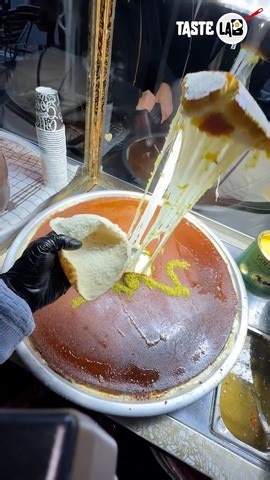 Golden shredded pastry filled with melted cheese and finished with sweet syrup. Crunchy on the outside, stretchy and indulgent inside. | Taste Lab