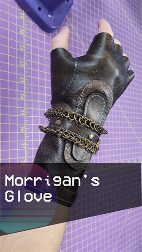 Eve on Instagram: "My glove for Morrigan is done! I'm happy to finally be able to use this pattern by DieselPunk (Tony See) with actual leather. I had to change part of the design to fit the reference for the cosplay, but this pattern is amazing for both soft fabrics and leather. #sewing #cosplay #handmade #diy #maker #handsewing #dragonage #morrigan #leather #leatherwork #leathercraft #dragonagecosplay"