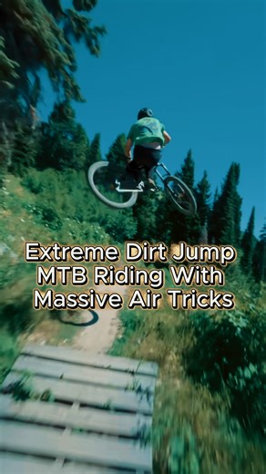 Extreme dirt jump MTB riding with massive air tricks