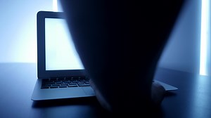 Computer Workplace Desk View in Modern City Office Workspace