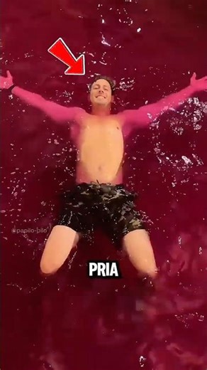 Why Is This Man Swimming in a Red Pool? 🤔