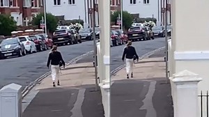 Viral video shows woman ‘frozen in time’ while walking on street. Internet is baffled
