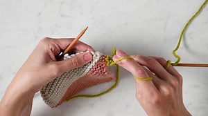 One marvelous feature of the Prism Blanket pattern is that you join those colorful squares together as you're knitting them. We love that you never have to go back and sew it together... You can cast off and move straight on to cozying up under your beautiful blanket! If you'd like a little help visualizing how this works, check out our Join As You Knit Tutorial, which will walk you through this easy technique, step-by-step. Follow our profile link to watch the entire video, and be sure to sign