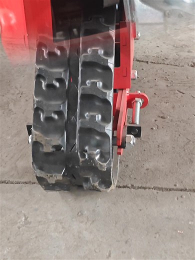 Detailed view of a lightweight rubber track chassis, suitable for retrofitting small agricultural machinery, tricycles, walk-behind tractors, and other equipment