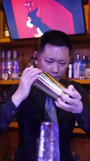 I added SQUID INK to a Ramos Gin Fizz... and this happened! 🦑🖤#shorts #cocktail #bartender #bar