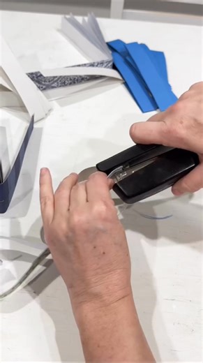 Paper heart chains are a simple way to add charm to your home for Valentine’s Day using things you probably already own! That means you don’t have to leave your house or spend money on seasonal decor to use a few weeks. . Tutorial: Cut patterned paper into 12 inch long by 1 inch wide strips. Fold in half, creasing the fold, and form the top two ends into a heart shape. Next, staple the top of the heart closed over the bottom of the previous paper heart. Make as long as you like. Enjoy! 💙🤍 #diy