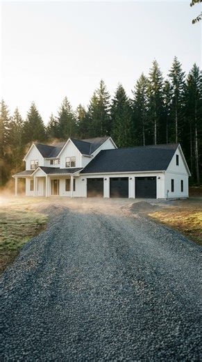Morning Mist & Modern Farmhouse. 🌫️🤍 The way the light hits the crisp white siding is perfection. Plus, that triple garage! #ModernFarmhouse #WhiteExterior #GarageGoals #morningvibes | Farmhouse Vibes