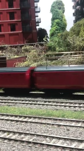 Class 86 pulling postal train on making tracks layout