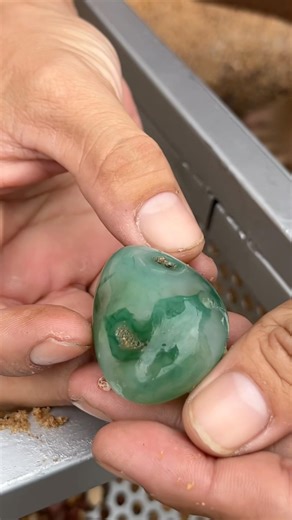 Unbelievable! A Green Agate Stone in Beach Sand