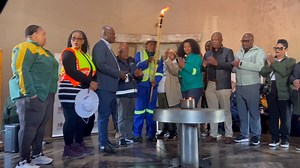 18K views · 124 reactions |  Lighting a flame of dedication, unity, and purpose.Deputy President Paul Mashatile symbolically lit the flame at Walter Sisulu Square, igniting a national movement for cleaner, greener towns. #ServiceDeliveryZA #CleanCitiesCampaign | South African Government | Facebook