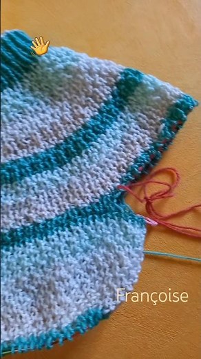 Progression of the child's sweater knitted Top-Down with a rounded yoke