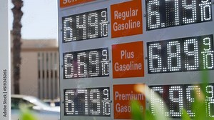 High Gas Prices on a Gas Station Sign in California, Medium Shot $6.49 Regular. Inflation.