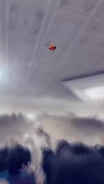 Crowd Excitement in a Bright Indoor Space