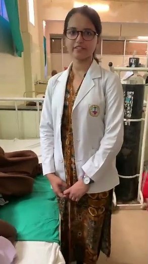 Demonstration of fluid thrill in ascites, Dept. Of Medicine, JNMC