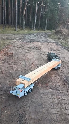 Tatra 815VT + Transporta SPDB40 loading with heavy 2m wooden beams