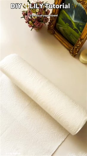 Crafted By Ayesha on Instagram: "From simple paper towels to a stunning Lily 🌼✨ Handmade beauty that blooms forever 💛 Easy, calming & absolutely aesthetic! #diyflowers #papercraftideas #flowerdecor"