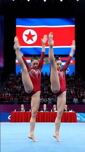North Korean Gymnasts Perform Synchronized Flexibility