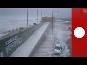 Video: Freak waves in Portugal whip up foam, sweep people off their feet