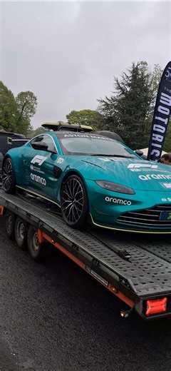 AN ASTON MARTIN FORMULA 1 SAFETY CAR LEAVING NEWBY HALL.