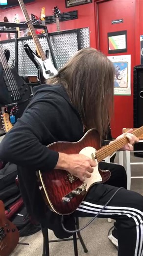 Kansas Lead Guitarist Scott Bernard trying out our new line of Neville custom guitars! So excited our friend stopped by for a visit before going back on tour!! #kansas #leadguitarist #customguitar #musicstore #shoplocal #moonchildmusicstore | moonchildmusicstore
