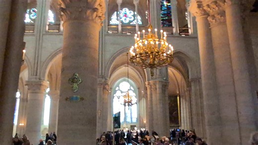 Admiring Notre-Dame of Paris' arcades and stained glass side windows. Construction began in 1163 under Bishop Maurice de Sully and continued through the 12th and 13th centuries, with completion around the mid-14th century. ChatGPT details: Notre-Dame de Paris is a medieval Catholic cathedral located on the Île de la Cité in Paris, France, reflecting the Gothic architectural style. The cathedral is known for its innovative use of flying buttresses, ribbed vaults, and pointed arches, which allowed