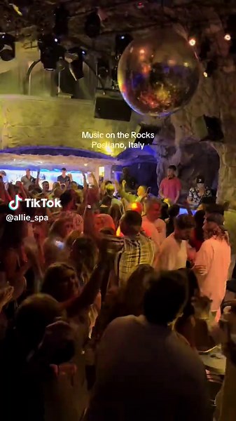 Club in a cave? Sign me up! #positano #italy #fyp #travel #musicontherocks