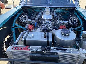 Steve Spiess turned to Jon Kaase Racing Engines to build this twin-turbo 565 cid engine for drag-and-drive competition in the Unlimited Iron class. With 2,600 hp on tap, this car can fly to 6-second ETs. Check it out in our newest Engine of the Week sponsored by PennGrade 1 High Performance Oil and Elring - Das Original. https://www.enginebuildermag.com/2025/02/twin-turbo-565-cid-kaase-engine/ #engines #enginebuilding #enginebuild #horsepower #Performance #jonkaase #twinturbo #turbocharged #drag