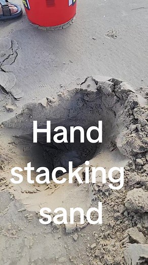 Sandcastle building # Hand Stacking wet sand watch American Champion Andy Hancock do this the easy way! #sandcastles #howto #howtobuildasandcastle #amazing #satisfying #ASMR #texas #beach #beachideas #easykidsactivities #oddlysatisfying #sandcastleday #doitright #addkids #southpadreisland #padre #familyspringbreak2024 #thingstodoonvacation