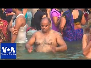 Thousands take holy dip in river Ganges to mark Hindu festival