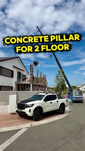 Constructing a Concrete Pillar for a Two-Story Structure