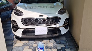 How to refill windshield washer fluid in Kia Sportage